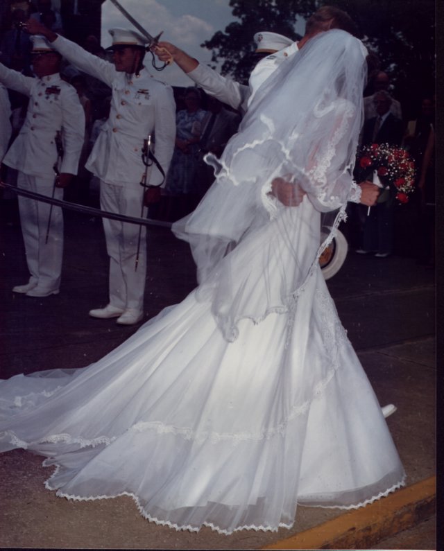 _019_steve_suzette_wedding_sword_arch_pass.jpg